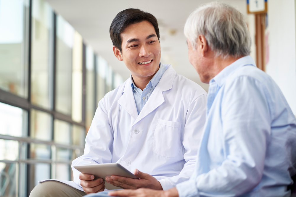 back doctor consulting a patient